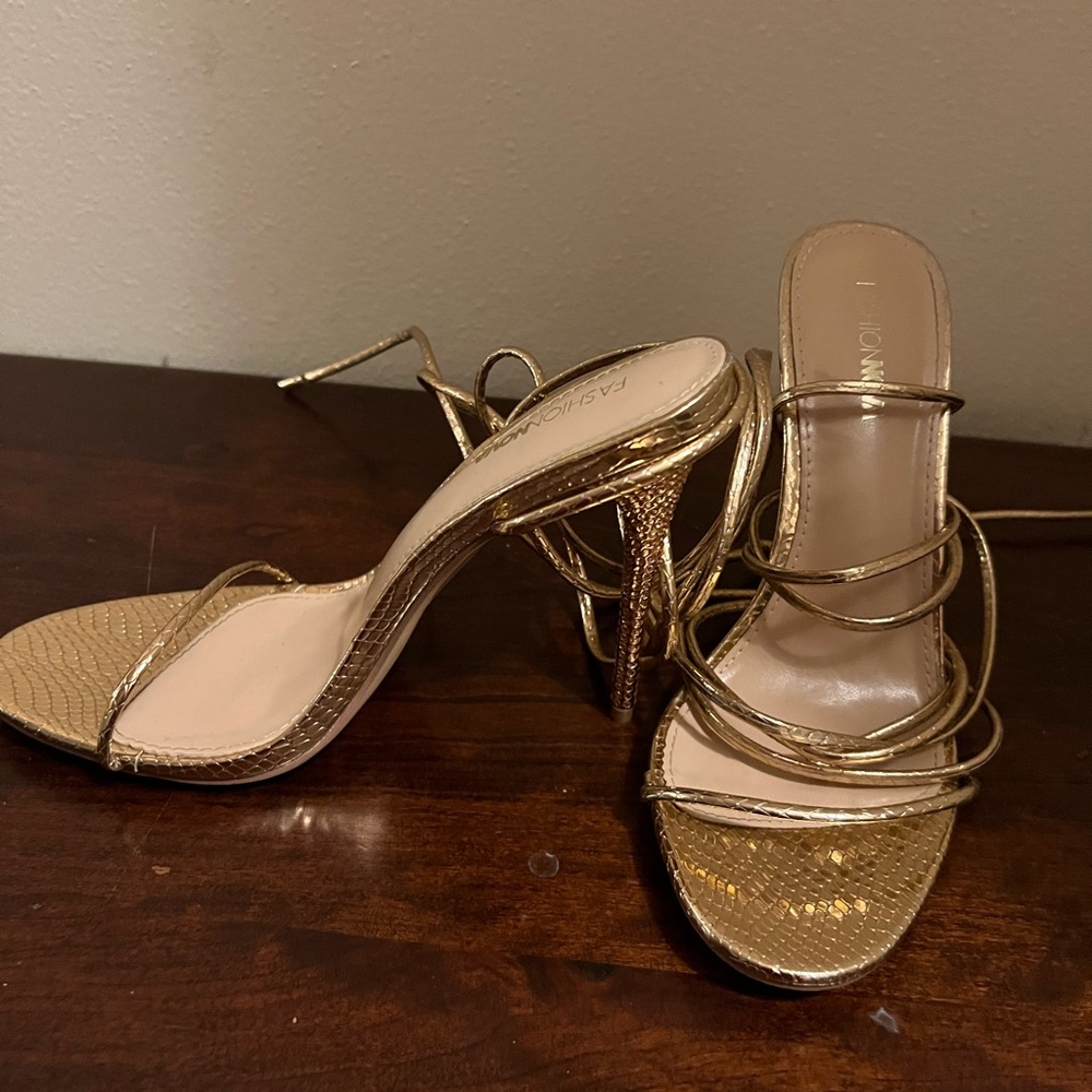 Gold, Strappy, tie up heeled sandal from Fashion Nova size 9.